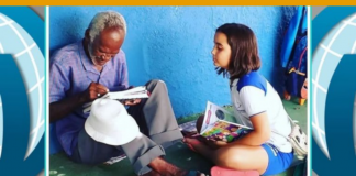 Estudante de 9 anos ensina vendedor de picolé  a ler e escrever