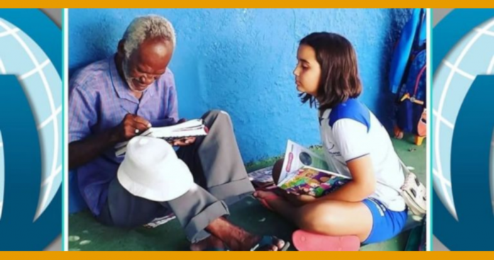 Estudante de 9 anos ensina vendedor de picolé  a ler e escrever