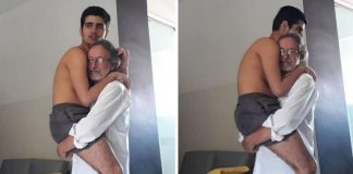 Avô segura neto autista de 17 anos no colo e foto viraliza