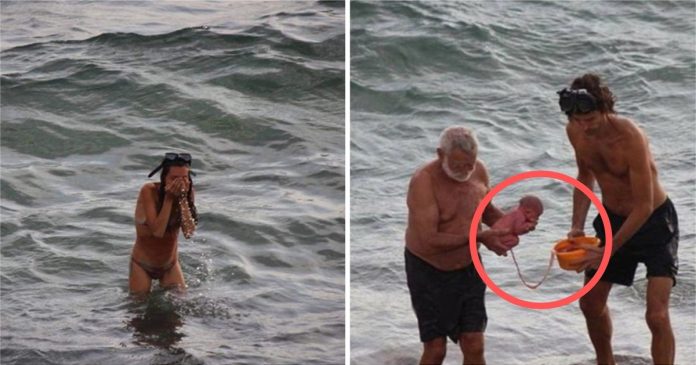Eles pensaram que ela estava mergulhando para nadar, mas então um bebê surgiu entre as ondas