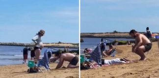 Ele cavou um buraco na praia para que sua esposa grávida pudesse se deitar